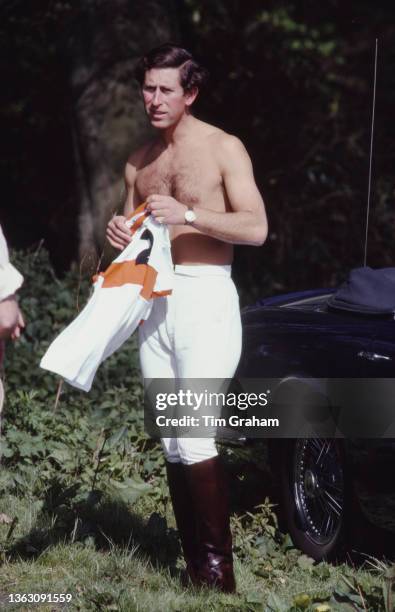 Prince Charles, the Prince of Wales changing before a polo match at Smith's Lawn in Windsor, UK, May 1979.