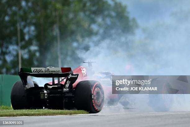 Alfa Romeo's Finnish driver Valtteri Bottas slides off the race track during the qualifying session at the Red Bull race track in Spielberg, Austria...