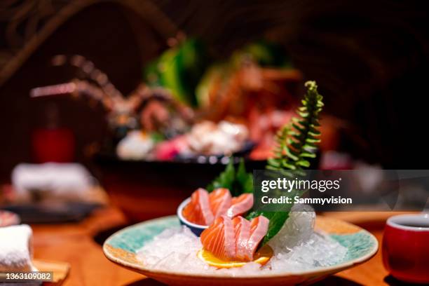 close-up of sashimi plate on the table - fresh wasabi stockfoto's en -beelden