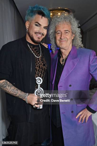 Adam Lambert, winner of the International Award, and Sir Brian May attend the Nordoff and Robbins O2 Silver Clef Awards at the JW Marriott Grosvenor...