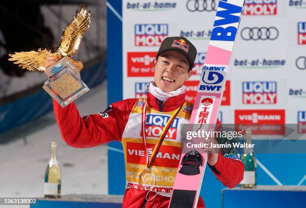 Overall winner Ryoru Kobayashi of Japan poses with the trophy after the Individual HS142 at the Four Hills Tournament Men Bischofshofen at...