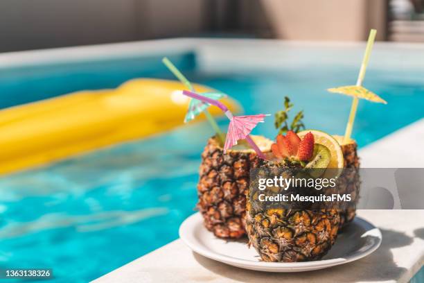 pineapple juice cocktail - drink umbrella stock pictures, royalty-free photos & images