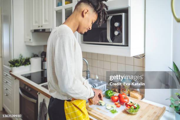 in the kitchen - rastafarian stock pictures, royalty-free photos & images