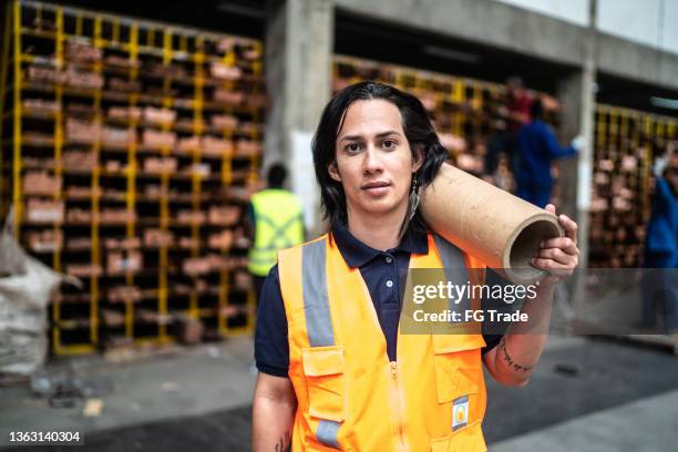 portrait of a non-binary person at a warehouse - non binary stereotypes stock pictures, royalty-free photos & images