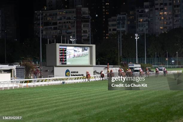 January 5 : Jockeys compete the Race 8 Cleveland Handicap at Happy Valley Racecourse on January 5, 2022 in Hong Kong.