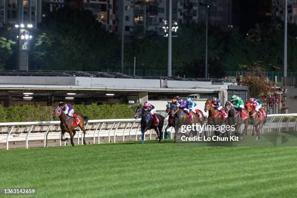 January 5 : Jockeys compete the Race 9 Great George Handicap at Happy Valley Racecourse on January 5, 2022 in Hong Kong.