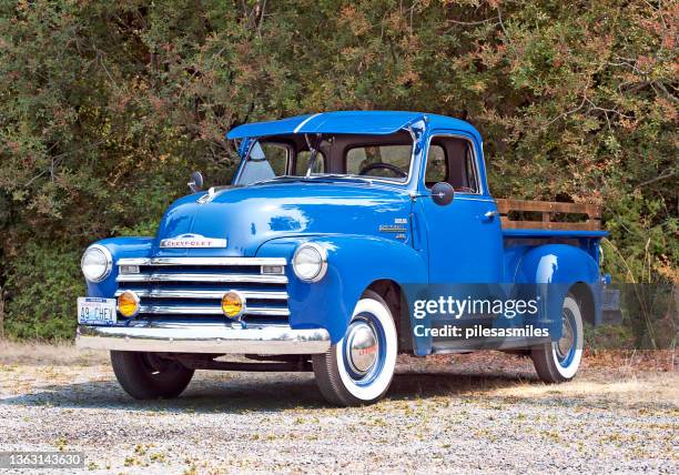 old blue chevrolet pickup truck, lopez island, san juan islands, northwest united states of america. - old truck stock pictures, royalty-free photos & images