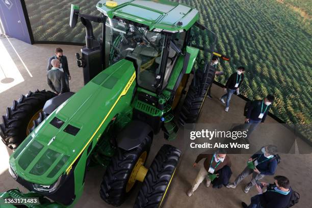 The John Deere 8R autonomous tractor is on display at the company booth at CES 2022 at the Las Vegas Convention Center on January 6, 2022 in Las...