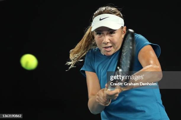 Amanda Anisimova of the United States plays a backhand in her match against Irina-Camelia Begu of Romania during day five of the Melbourne Summer Set...