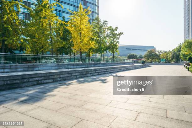 parking lot outside office buildings - pavement stock pictures, royalty-free photos & images