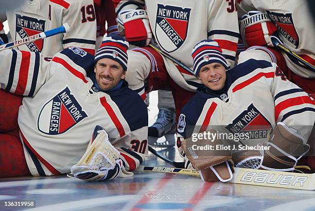 Henrik Lundqvist and Martin Biron of the New York Rangers poses for a photo during the 2012 Bridgestone NHL Winter Classic Practice Sessions at...