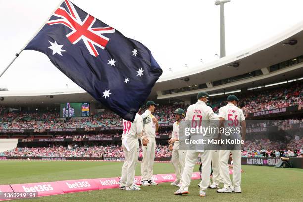 Australian players prepare to take the field during day three of the Fourth Test Match in the Ashes series between Australia and England at Sydney...
