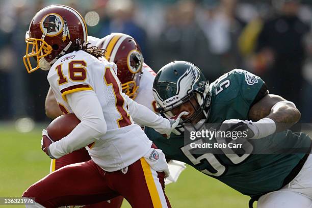 Brandon Banks of the Washington Redskins eludes the tackle of Akeem Jordan of the Philadelphia Eagles on a kick off return during the second half at...