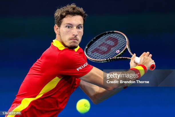 Pablo Carreno Busta of Spain plays a backhand in his semi final match against Jan Zielinski of Poland during the day seven 2022 ATP Cup tie between...