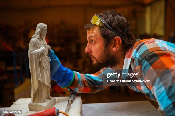 making an art from the stone is majestic talent - white jesus stock pictures, royalty-free photos & images