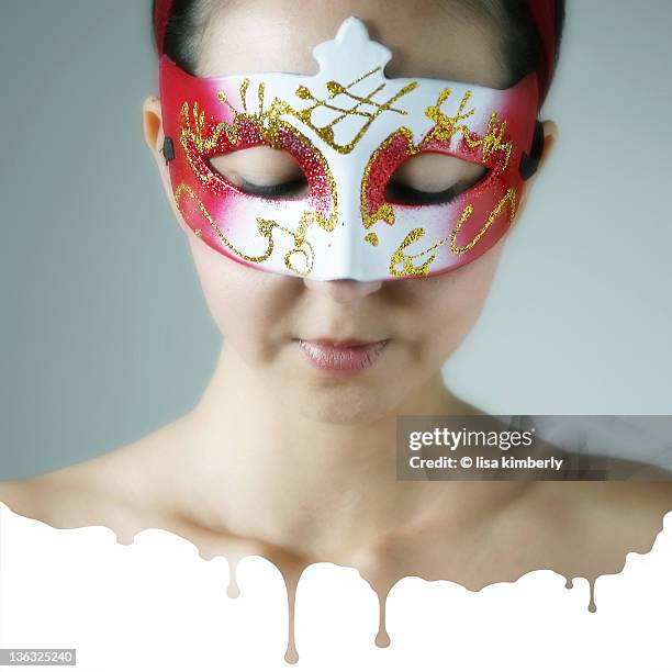 woman wearing venetian mask - gimp mask stock pictures, royalty-free photos & images