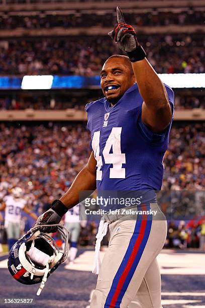 Ahmad Bradshaw of the New York Giants celebrates after a rushing touchdown in the second quarter against the Dallas Cowboys at MetLife Stadium on...
