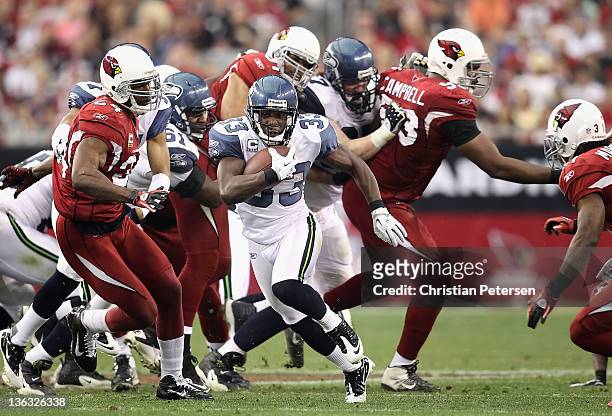 Runningback Leon Washington of the Seattle Seahawks carries the football on a 48 yard rushing touchdown against the Arizona Cardinals during the...