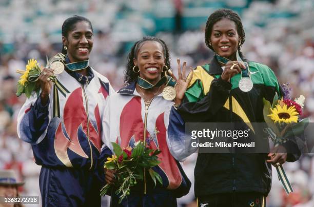 Gold medallist Gail Devers from the United States, second placed silver medallist Merlene Ottey Jamaica and third placed bronze medallist Gwen...