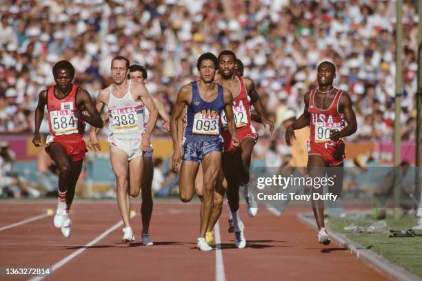 Gold medalist Joaquim Cruz from Brazil leads from Edwin Koech of Kenya, Steve Ovett of Great Britain and Earl Jones of the United States running in...