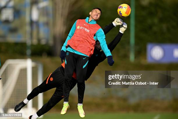 Alexis Sanchez of FC Internazionale and Samir Handanovic of FC Internazionale during the FC Internazionale training session at the club's training...