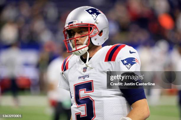 Brian Hoyer of the New England Patriots warms up before the game against the Indianapolis Colts at Lucas Oil Stadium on December 18, 2021 in...