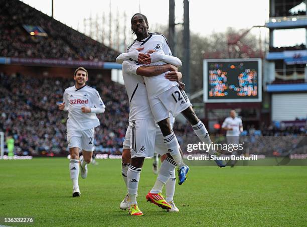 Nathan Dyer of Swansea City celebrates after scoring during the Barclays Premier League match between Aston Villa and Swansea City at Villa Park on...