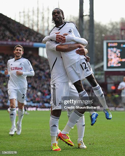 Nathan Dyer of Swansea City celebrates after scoring during the Barclays Premier League match between Aston Villa and Swansea City at Villa Park on...