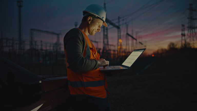 https://media.gettyimages.com/id/1363323684/video/energy-systems-electricity-maintenance-engineer-working-on-the-field-at-power-station-at-dusk.jpg?b=1&s=640x640&k=20&c=MSEjaSOcAwq1GQo1_OGTC-lNT34e1XyTyBXq_0ywZdM=