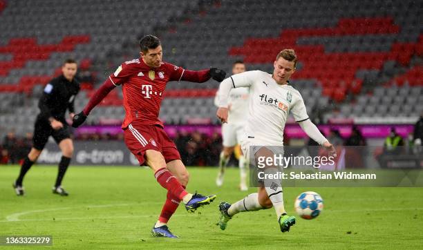 Robert Lewandowski of Muenchen scores his teams first goal during the Bundesliga match between FC Bayern München and Borussia Mönchengladbach at...