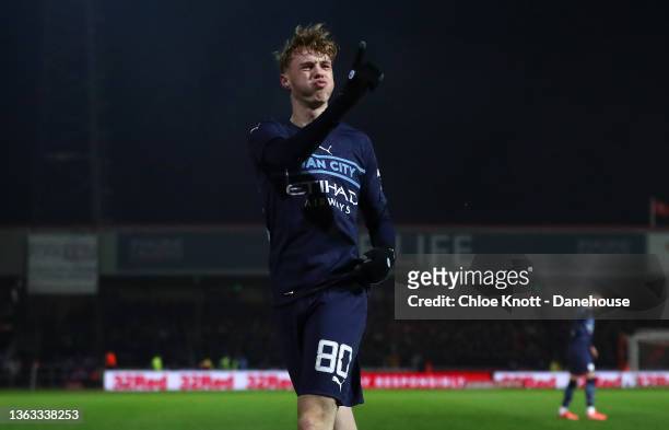 Cole Palmer of Manchester City celebrates after scoring their fourth goal during the Emirates FA Cup Third Round match between Swindon Town and...