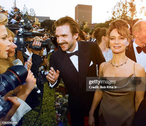Ralph Fiennes and Francesca Annis arrive at the Academy Awards Show, March 24,1997 in Los Angeles, California.