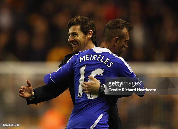 Andre Villas-Boas manager of Chelsea celebrates victory with Raul Meireles after the Barclays Premier League match between Wolverhampton Wanderers...