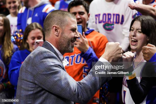 Head football coach Billy Napier of the Florida Gators meets with fans during halftime of a basketball game against the Alabama Crimson Tide at the...