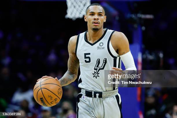 Dejounte Murray of the San Antonio Spurs dribbles during the third quarter against the Philadelphia 76ers at Wells Fargo Center on January 07, 2022...