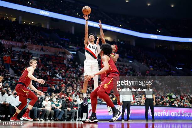 Anfernee Simons of the Portland Trail Blazers shoots the ball against Rajon Rondo of the Cleveland Cavaliers during the first half at Moda Center on...