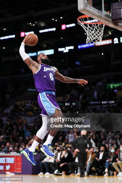 LeBron James of the Los Angeles Lakers dunks against the Atlanta Hawks in the second half at Crypto.com Arena on January 07, 2022 in Los Angeles,...