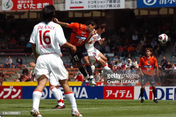 Mauricio Salles of Omiya Ardija heads to score his side's first goal during the J.League J1 match between Omiya Ardija and Nagoya Grampus Eight at...