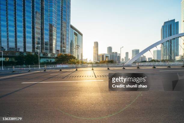 urban elevated road at sunset - bridge building glass stock pictures, royalty-free photos & images