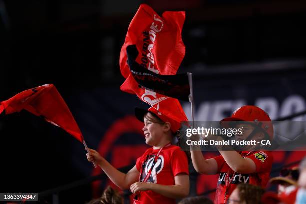 Young fans show their support during the Men's Big Bash League match between the Melbourne Renegades and the Sydney Thunder at Marvel Stadium, on...