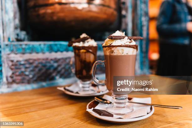 two decadent hot chocolates served in a trendy cafe - cocoa stock pictures, royalty-free photos & images