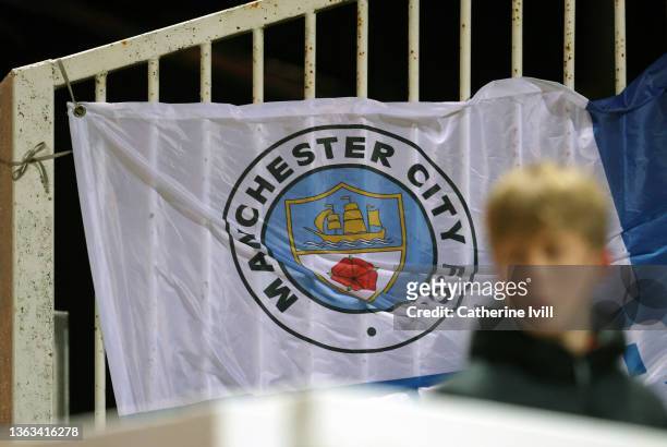 View of the Manchester City club badge on a flag during the Emirates FA Cup Third Round match between Swindon Town and Manchester City at County...