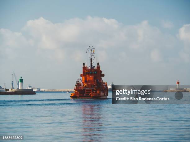 cartagena, spain - 08/14/2019: a ship of "salvamento marítimo" which in english means "security and maritime rescue" leaves the port of cartagena to the mediterranean sea - africa craft bildbanksfoton och bilder