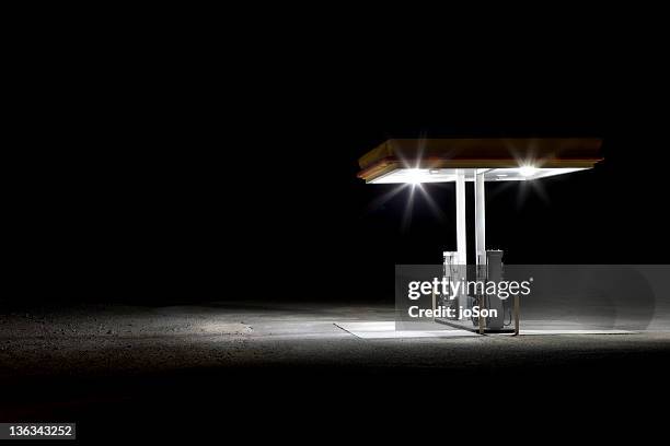 gas station in desert at night - bensinstation bildbanksfoton och bilder