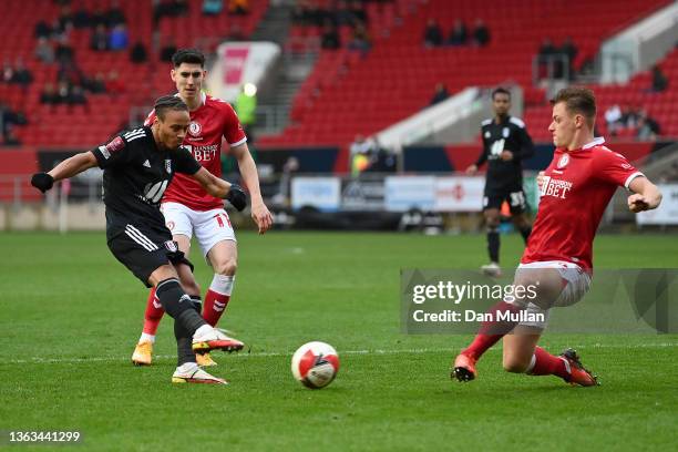 Bobby Reid of Fulham has a shot on goal blocked by Cameron Pring of Bristol City during the Emirates FA Cup Third Round match between Bristol City...