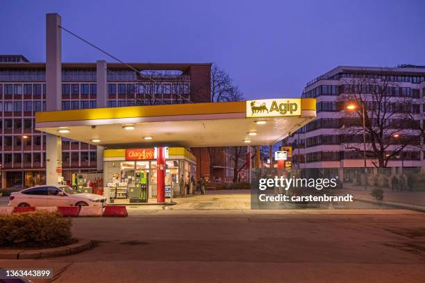 german gas station at night - munich germany urban skyline stock pictures, royalty-free photos & images