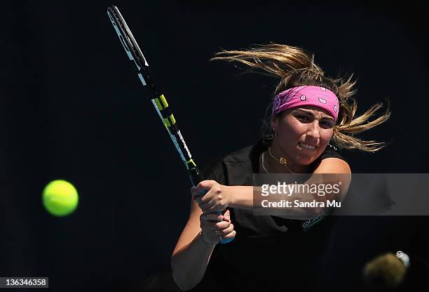 Aravane Rezai of France plays a shot in her match against Shuai Peng of China during day two of the 2012 ASB Classicat ASB Tennis Centre on January...