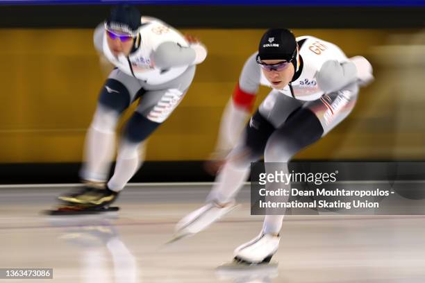 Claudia Pechstein and Leia Behlau of Germany compete in the Women's 3000m during the ISU European Speed Skating Championships at Thialf Arena on...