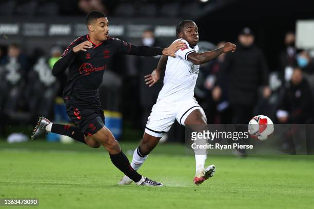 Yan Valery of Southampton fouls Michael Obafemi of Swansea City which leads to a red card during the Emirates FA Cup Third Round match between...