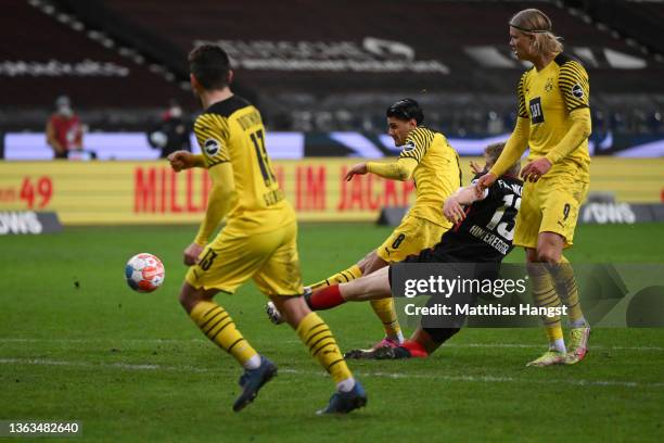 Mahmoud Dahoud of Borussia Dortmund scores their team's third goal during the Bundesliga match between Eintracht Frankfurt and Borussia Dortmund at...